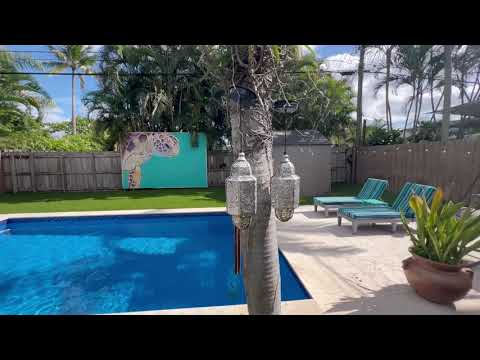 Video still: The backyard: heated pool, shallow end and fire pit