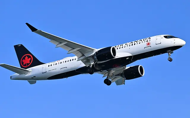 An Air Canada Airbus A220-300 on final approach