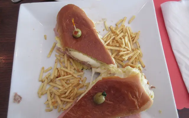 A Cuban sandwich with shoestring fries on Calle Ocho in Little Havana, Miami