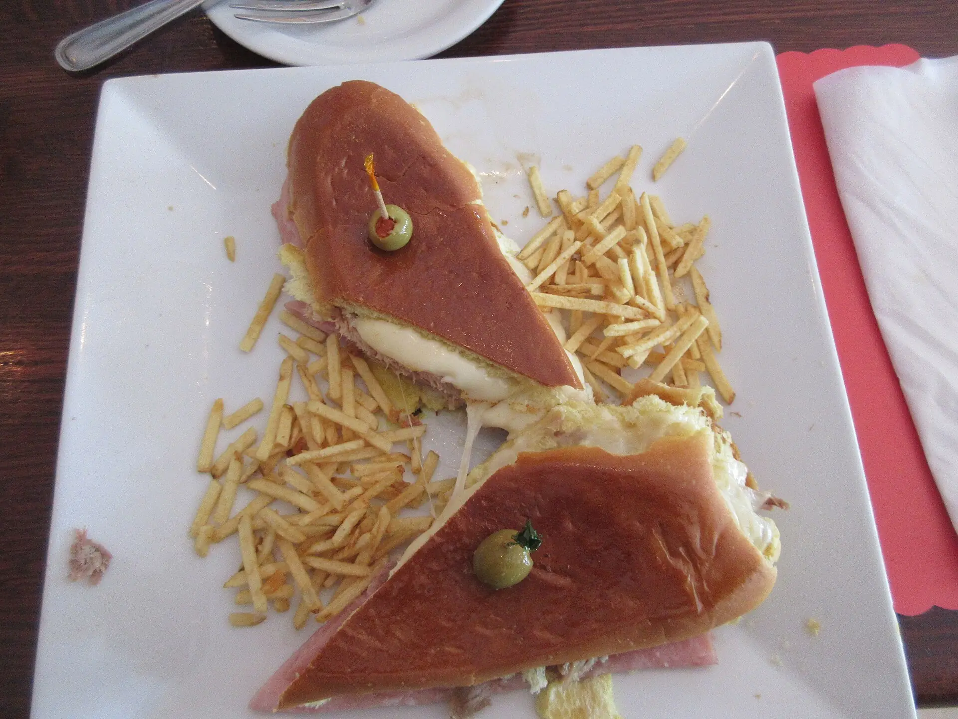 A Cuban sandwich with shoestring fries on Calle Ocho in Little Havana, Miami