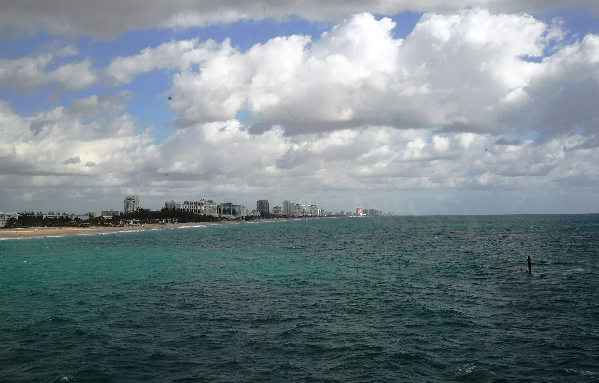 Turquoise water off Fort Lauderdale's Atlantic coast, with the beachfront in the distance