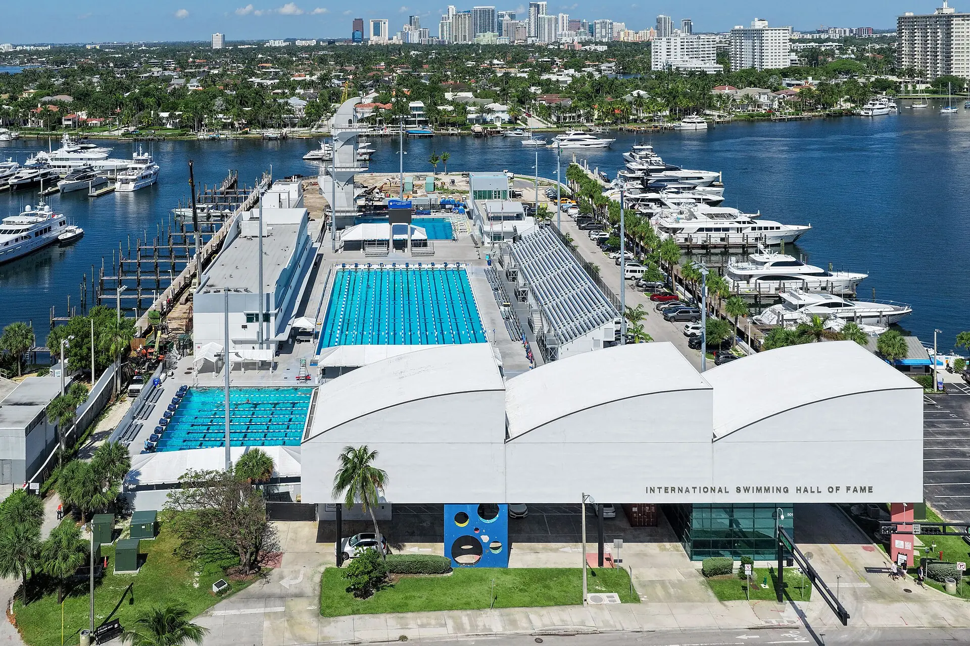 An aerial view of the International Swimming Hall of Fame aquatic center and adjacent yacht marina along the Intracoastal Waterway in Fort Lauderdale