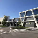 Brightline Fort Lauderdale Station: the station's white frame facade in downtown Fort Lauderdale
