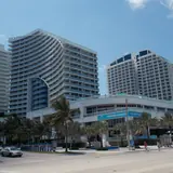 Steak 954: exterior street view of the W Fort Lauderdale hotel and residences complex along Fort Lauderdale Beach Boulevard